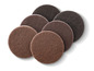 Kulaté brusné podložky v různých odstínech hnědé.