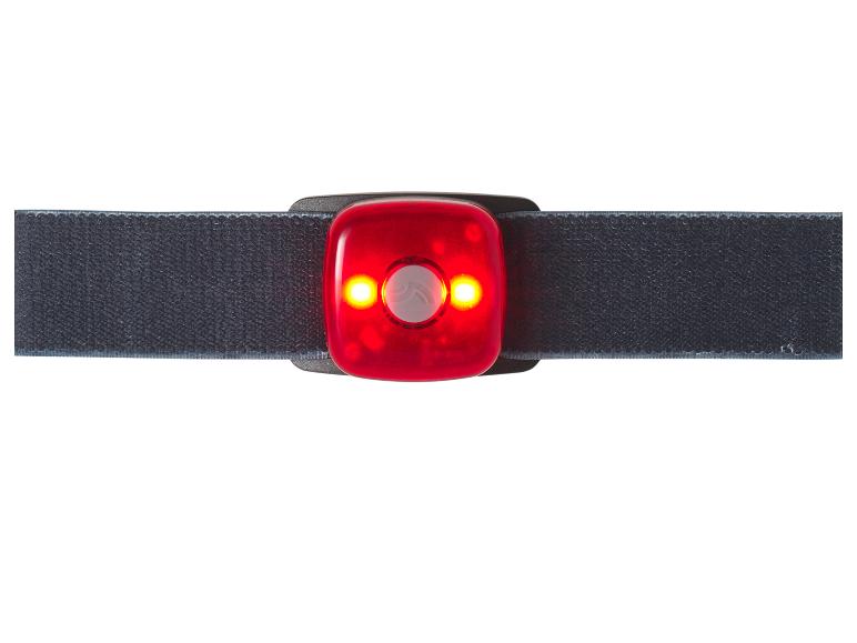 Červené LED bezpečnostní světlo s černým popruhem, svítící.