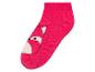 Růžové ponožky se zvířecím motivem.