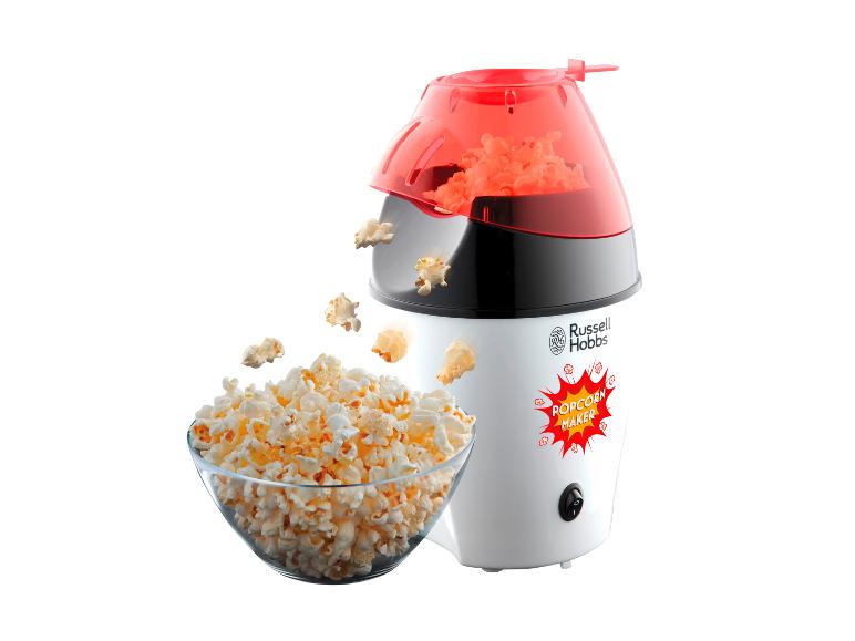 Popcorn v misce vedle bílého popcorn stroje Russell Hobbs.