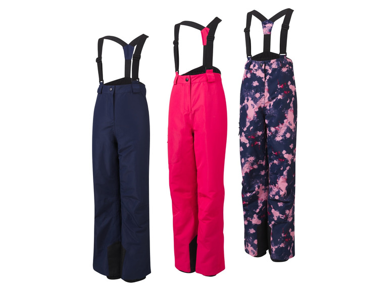 Tři různé lyžařské kalhoty s popruhy