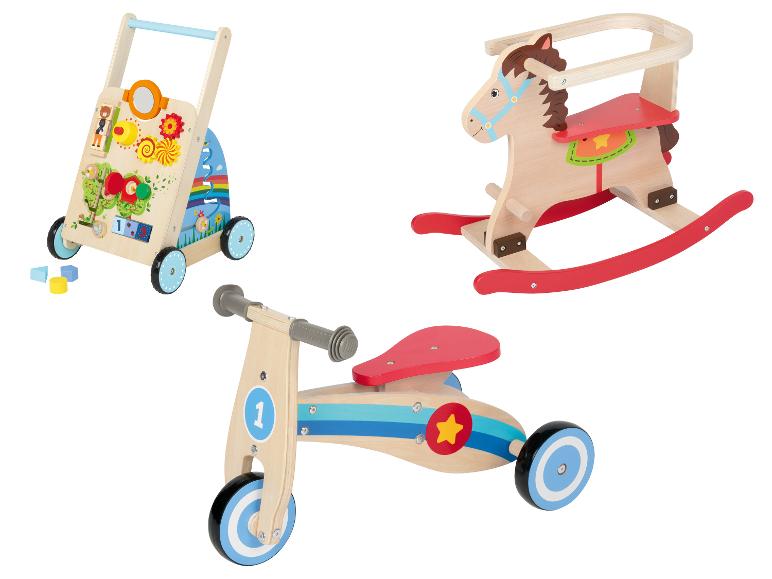 Dřevěné chodítko, houpací kůň a odrážedlo.