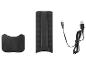 Černý držák na mobilní telefon s nabíjecím kabelem USB-C a příslušenstvím.