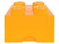 Oranžová úložná krabička ve tvaru LEGO kostky.