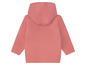 Růžová dětská bunda s kapucí.