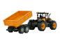 Traktor JCB s oranžovým přívěsem, hračky.