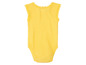 Žluté body pro miminko s krajkou.