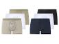 Sada boxerů: béžové, bílé, černé a tmavě modré.