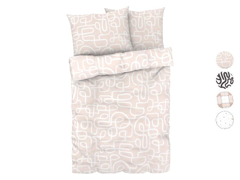 Béžová přikrývka s bílým vzorem zakřivených čar