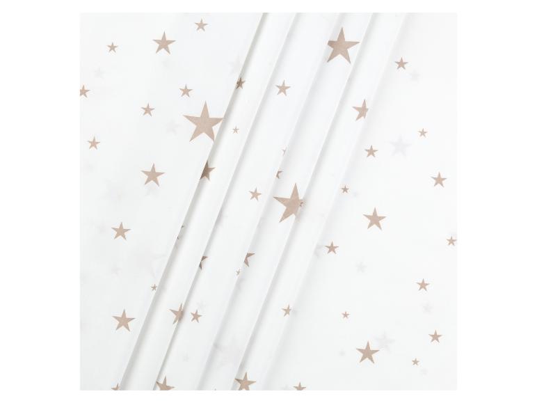 Bílá látka s béžovými hvězdami