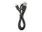 Černý kabel USB-C na USB-A, stočený a zajištěný, na bílém pozadí.