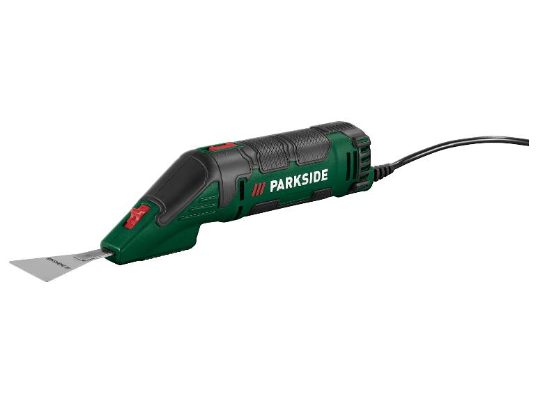 Zelené a černé elektrické nářadí s kovovou čepelí a černým kabelem.