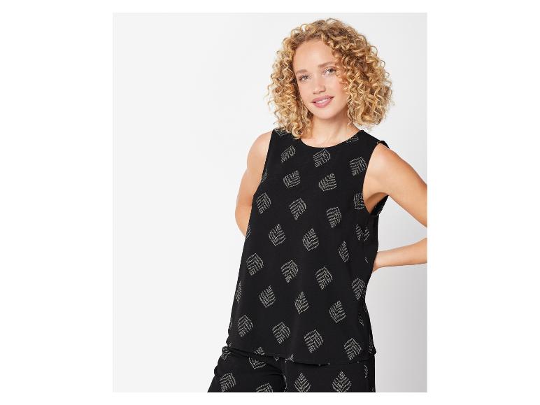Souprava: top a kalhoty, vzor listů, boho styl.
