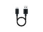 Krátký černý kabel USB-C na USB-A, stočený do smyčky.