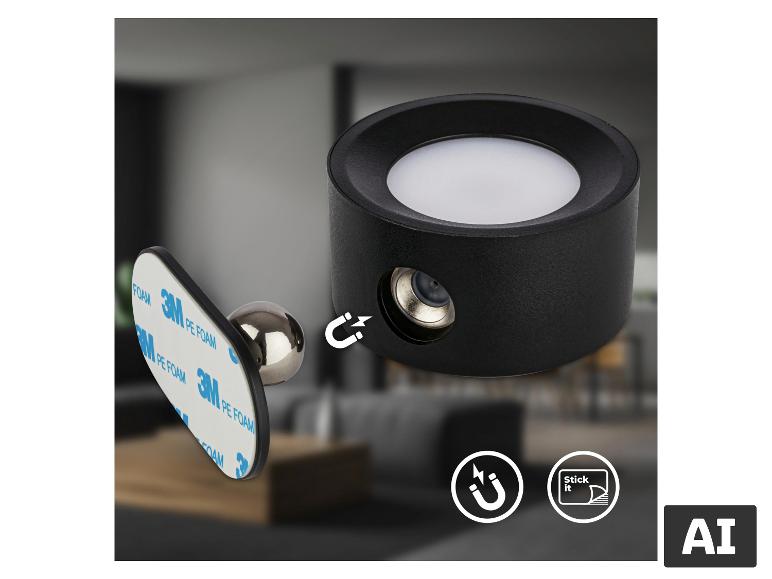 Černé magnetické LED světlo s bílým difuzorem, zobrazené s jeho samolepicí magnetickou základnou.
