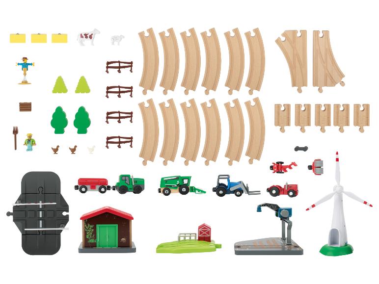 Sada hraček vláčku s farmářskou tématikou, s kolejemi, vozidly a doplňky.