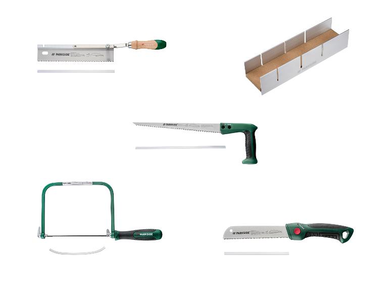 Sada ručních pil a pokosnice na řezání dřeva.