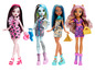 Čtyři panenky Monster High v elegantních šatech s odpovídajícími kabelkami.