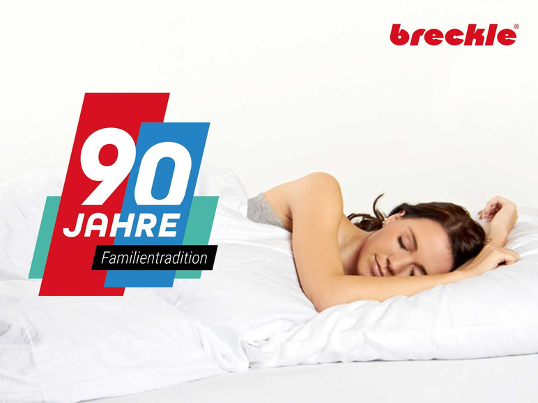 Žena spí na polštáři Breckle.