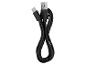 Černý nabíjecí kabel USB-C s konektorem USB-A, stočený do osmičky.