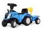 Modrý dětský traktor New Holland se žlutou lopatou.
