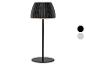 Černá stolní lampa s plisovaným stínidlem a dvěma barevnými variantami.