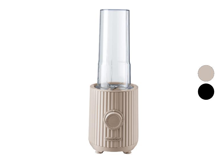 Mini mixér SilverCrest v béžové barvě s průhlednou nádobou a černou a béžovou barevnou variantou.
