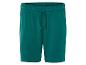 Tmavě zelené sportovní šortky, volný styl.