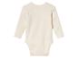 Krémové dětské body s dlouhým rukávem.