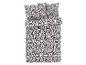 Přikrývka a povlečení na polštáře s abstraktním vzorem v černé a bílé barvě.