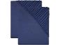 Dvě tmavě modré jerseyové prostěradla s gumou.