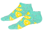 Dva páry tyrkysových ponožek s citronovým vzorem.