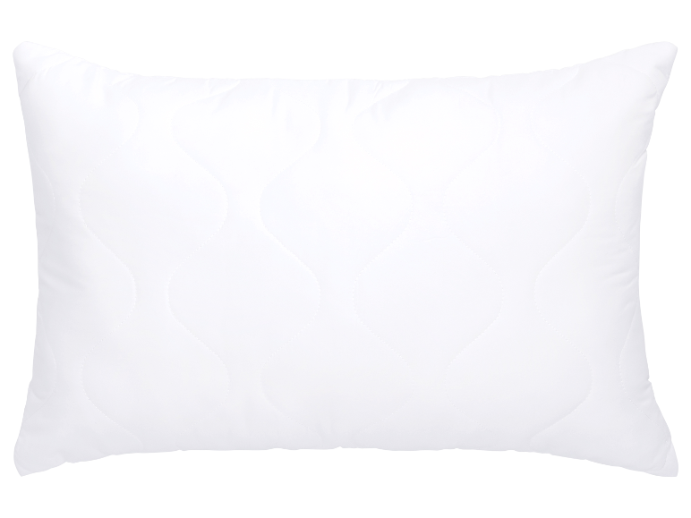 Bílý prošívaný polštář.