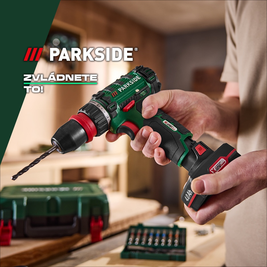 Muž drží akumulátorovou vrtačku s vrtákem, v pozadí je kufr s nářadím a sada bitů. Text: ZVLÁDNETE TO!