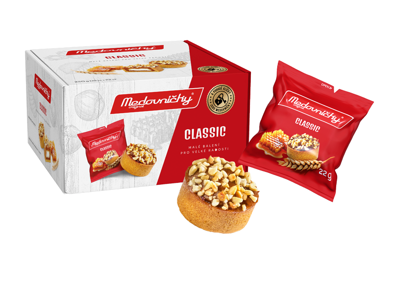 Krabička a sáčky s medovými dortíky s ořechy, nápis 'CLASSIC' a 'MALÉ BALENÍ PRO VELKÉ RADOSTI'.