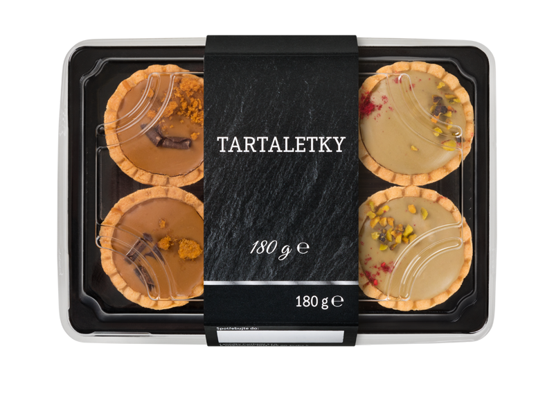 Balení čtyř karamelových a pistáciových tartaletek s nápisem „TARTALETKY“ a „180 g e“.
