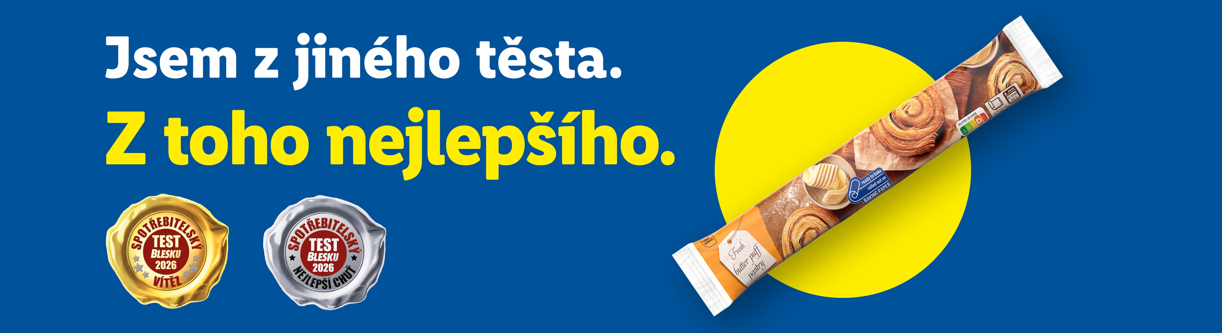 Reklamní banner s textem „Jsem z jiného těsta. Z toho nejlepšího.“ a baleným listovým těstem.