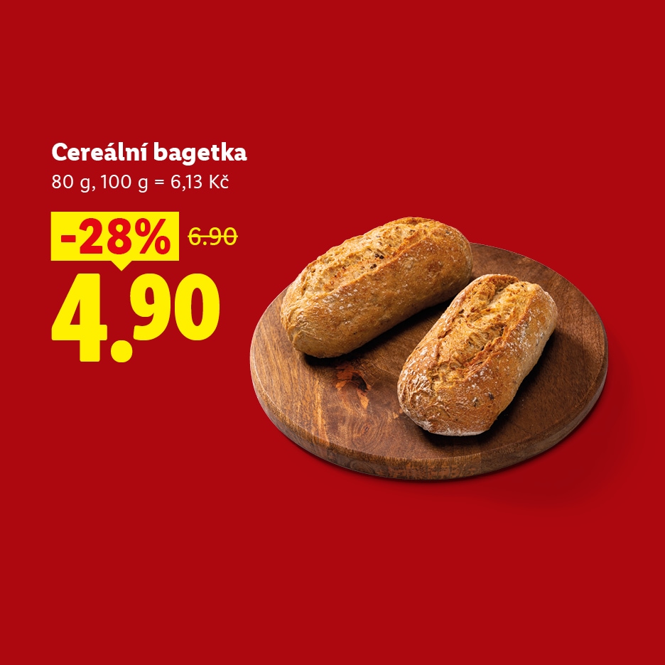 Dvě cereální bagetky na dřevěném prkénku, s cenou 4,90 Kč a slevou 28 %.