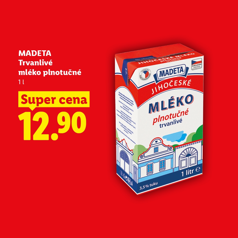 Karton plnotučného mléka s cenou 12,90 Kč.