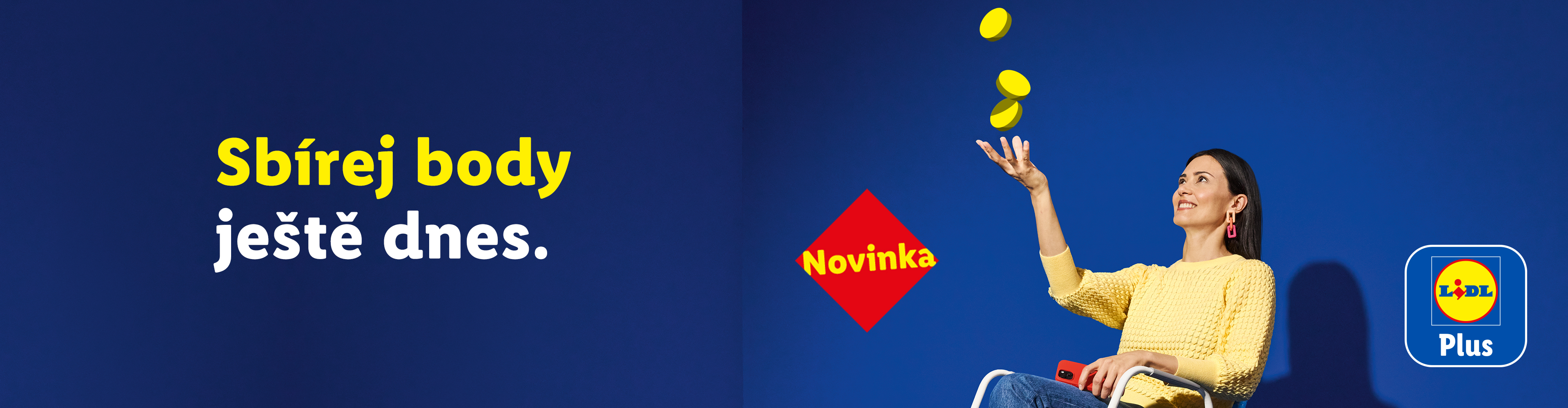 Modré pozadí se žlutými ovály, červeným štítkem „Novinka“ a textem „Sbírej body. Odměň se.“